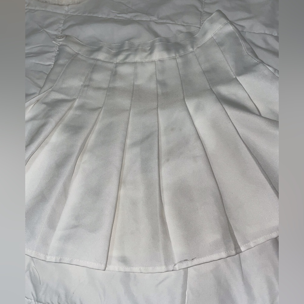White tennis style skirt.